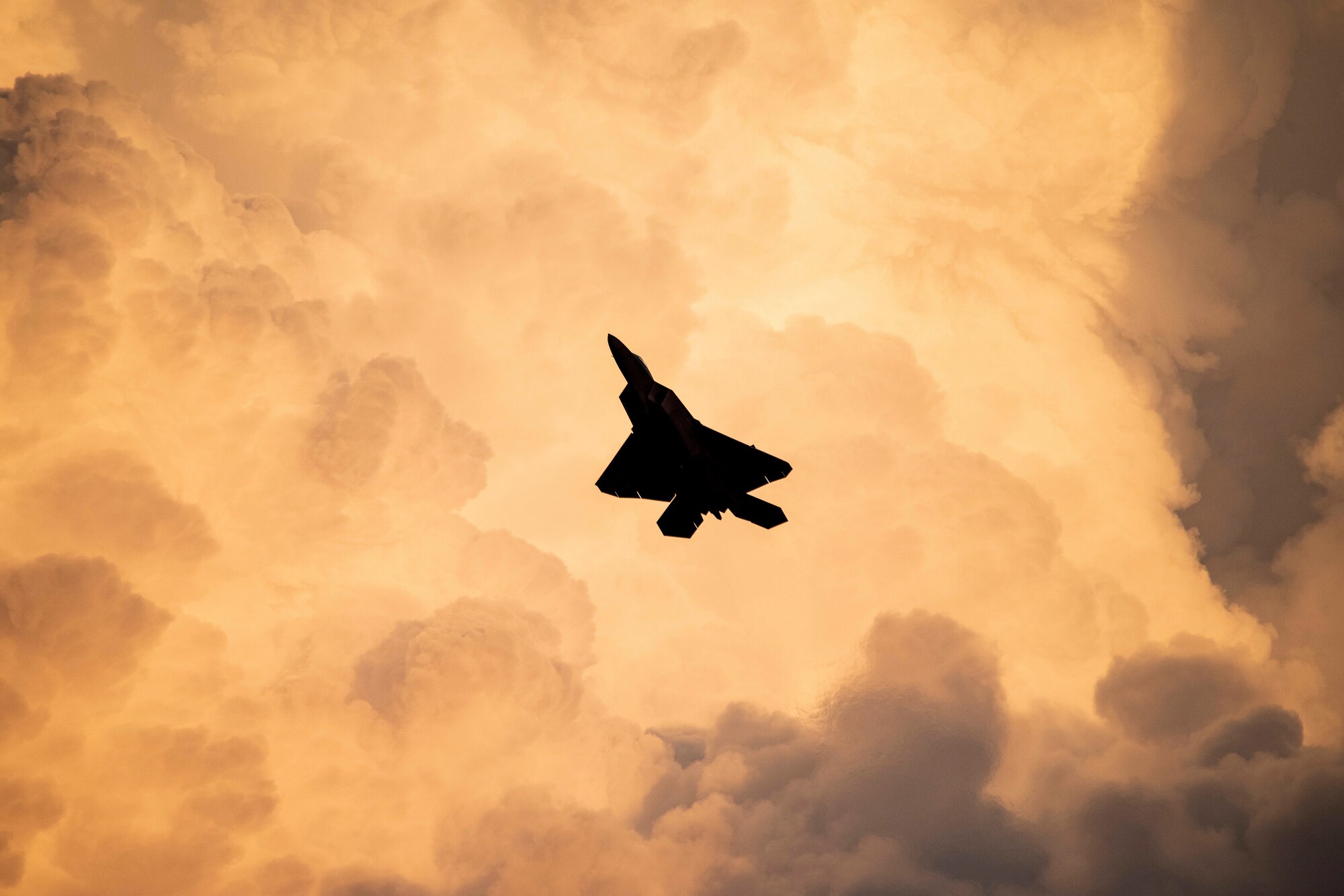 F-22 Raptor Demonstration Team commander, flies a twilight demonstration