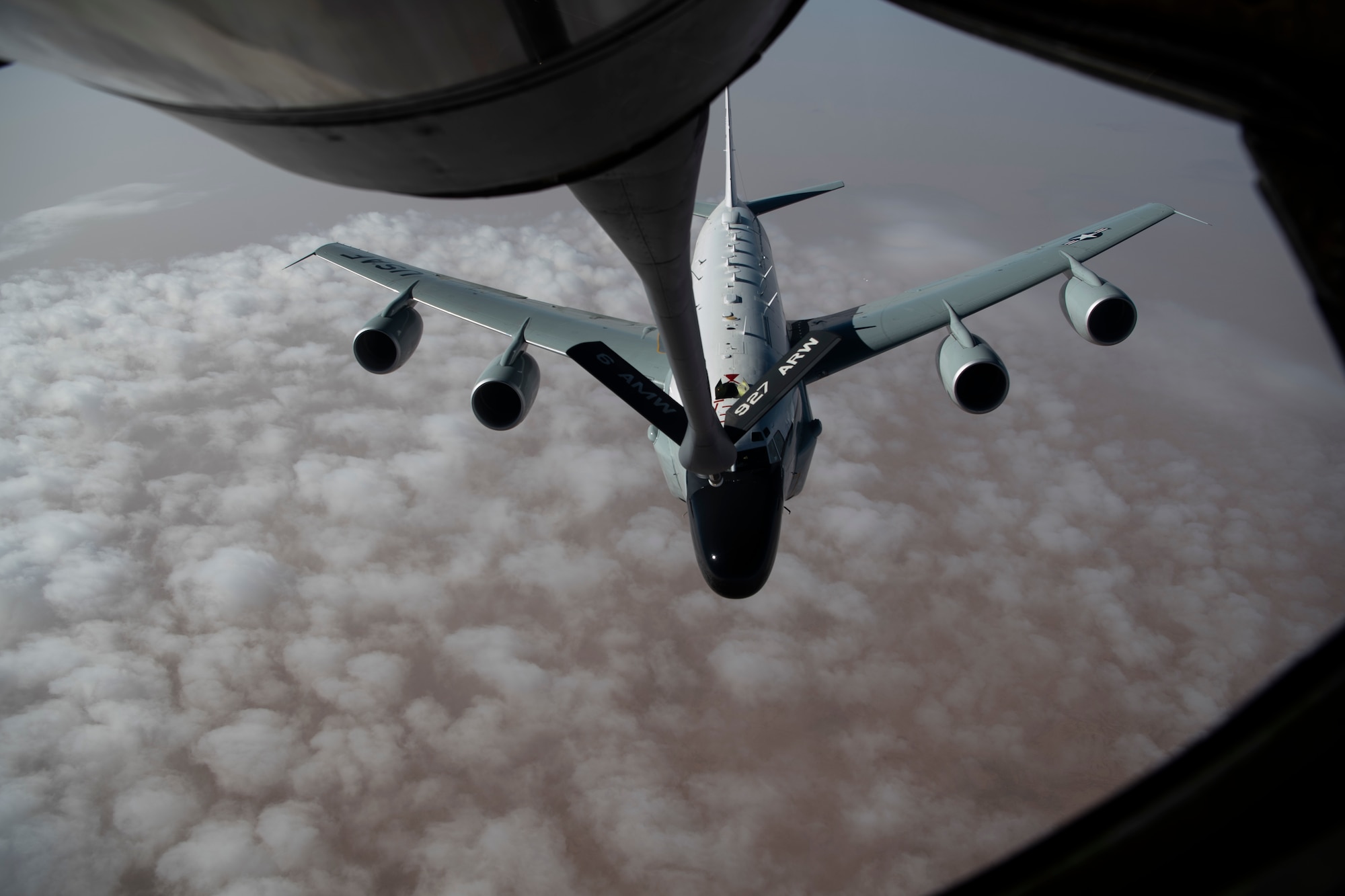 An RC-135 Rivet Joint receives fuel from a KC-135 Stratotanker