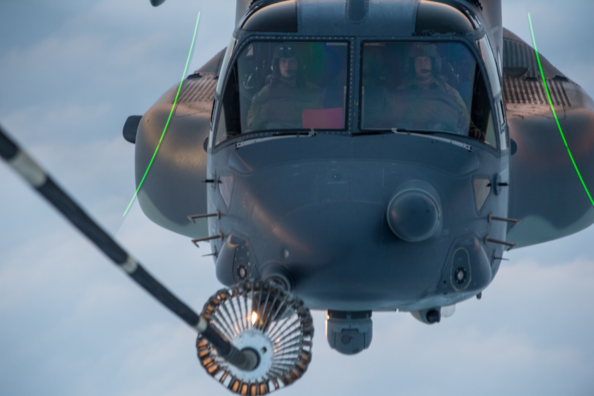 A KC-10 Extender refuels a CV-22 Osprey