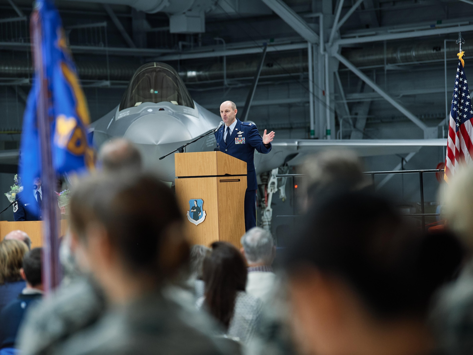 Col. David Shevchik, incoming commander of the 158th Fighter Wing, Vermont Air National Guard, addresses wing members, family and friends in attendance during a change of command ceremony