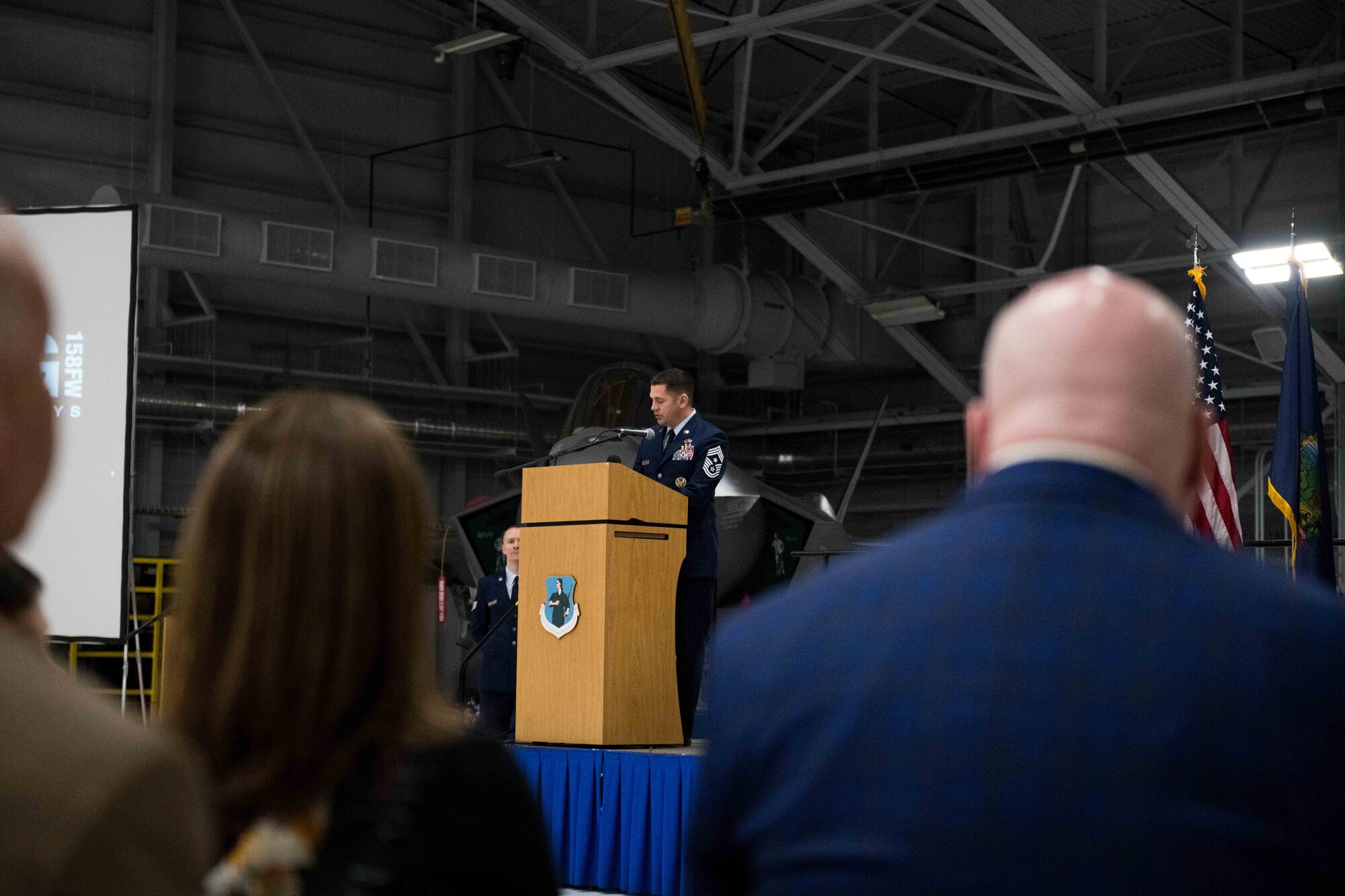 Chief Master Sgt. Darin Mauzy, wing command chief, Vermont Air National Guard, addresses wing members, family and friends in attendance during a change of command ceremony