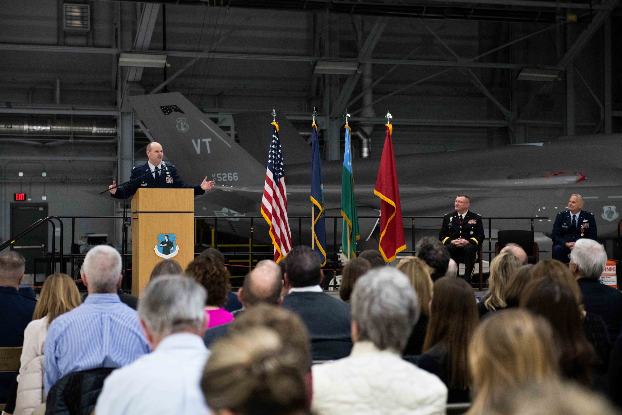 Col. David Shevchik Jr., incoming commander of the 158th Fighter Wing, Vermont Air National Guard, addresses Airmen, family and friends in attendance during a change of command ceremony