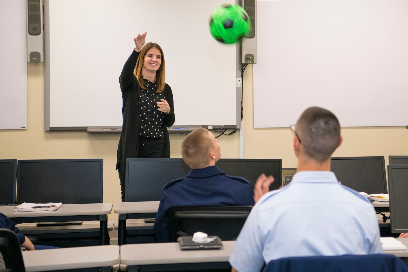 Dr. Julie Landry uses a soccer ball as an ice breaker during a new student briefing at JBSA-Randolph. Landry is the first psychologist to work at the 558th Flying Training Squadron at Randolph.
