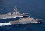 USS Detroit (LCS 7) and USS Gridley (DDG 101) perform division tactics.