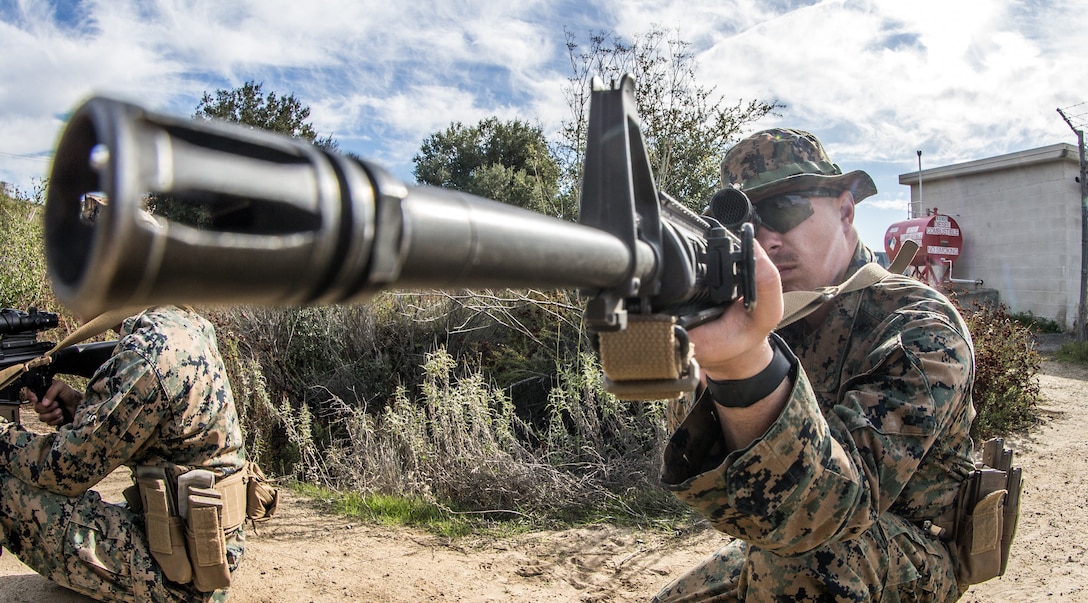 A U.S. Marine sights in on a barrel at the 1st Maint. Bn. Marksmanship Trainer Unit on Marine Corps Base Camp Pendleton, California, Jan. 7.