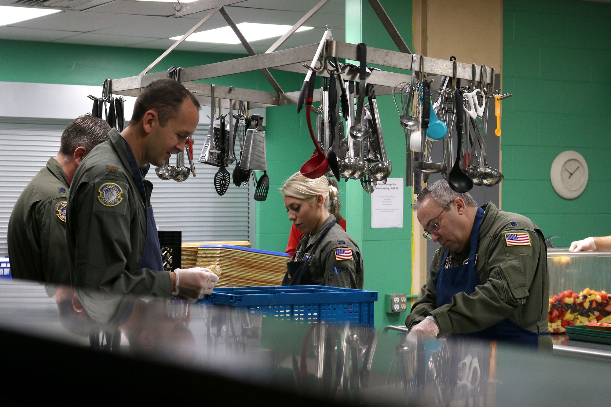 Ten Airmen from the 89th Airlift Squadron volunteer at the House of Bread, Dayton, Ohio, Dec. 8, 2019. The House of Bread serves nearly 250 people a day. (U.S. Air Force photo/Staff Sgt. Joel McCullough)