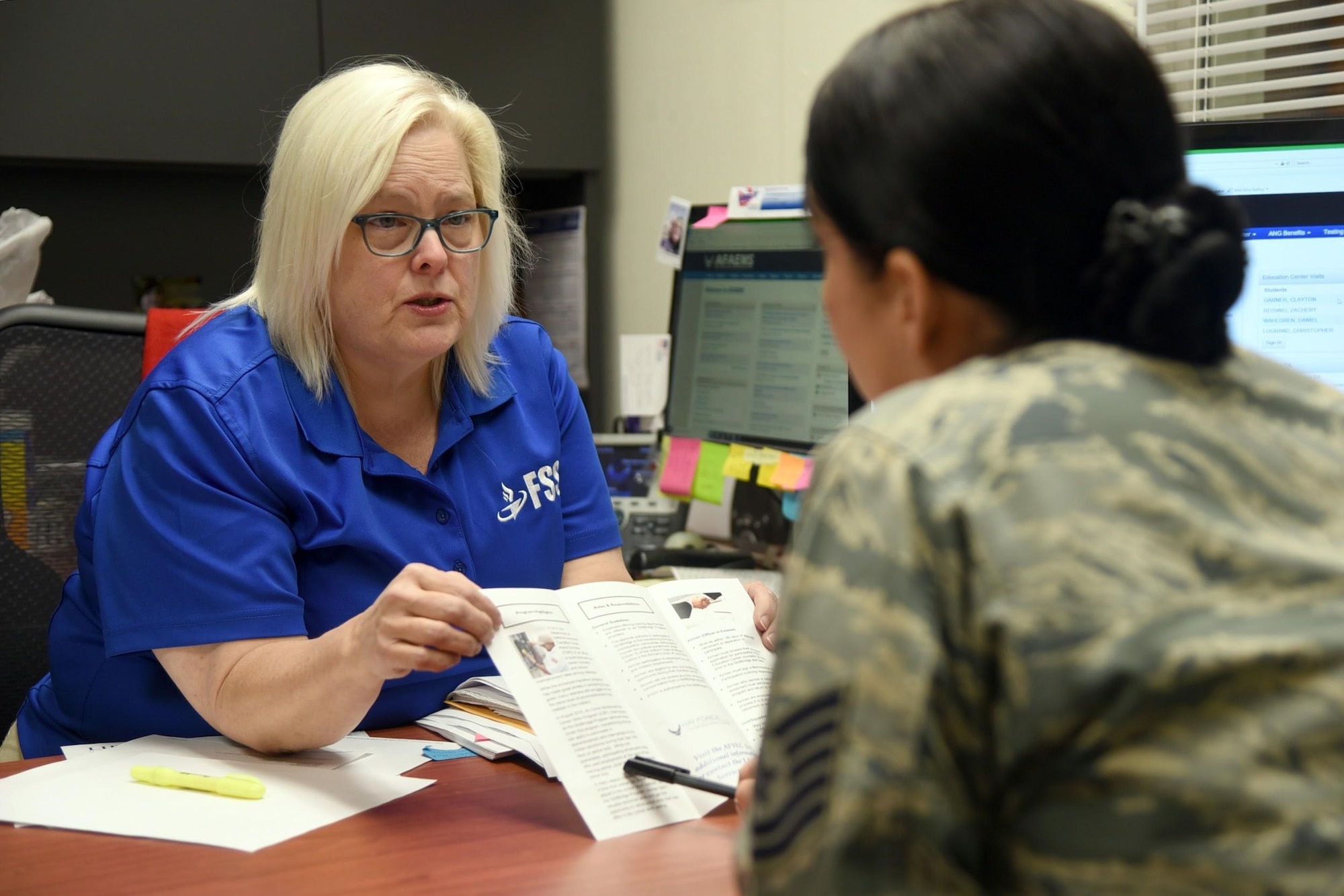 Chris Kern-Garcia, with the 72nd Force Support Squadron Education Services Center, informs an Airman about the SkillBridge program. The program enables Airmen to intern, apprentice, job shadow and even do on-the-job training in the civilian workforce during their last 180 days of active duty while learning skills which may differ from their military job. For more information, visit the Air Force Virtual Education Center or contact the Education Services Center at (405)739-7408. 
(U.S. Air Force photo/Kelly White)