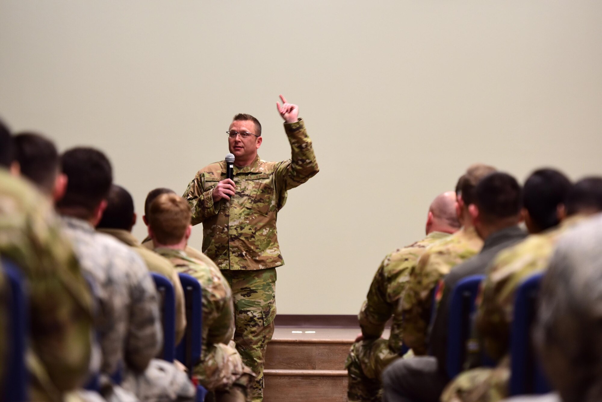 Chief Master Sergeant David Wade, Command Chief of Air Combat Command, speaks with Airmen in an all-call at Creech Air Force Base.