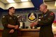 A lieutenant speaks with General Mike Holmes, commander of Air Combat Command, during a visit.