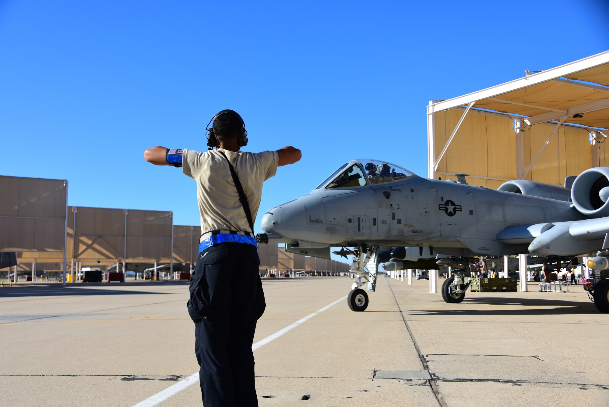 Airman marshals an A-10