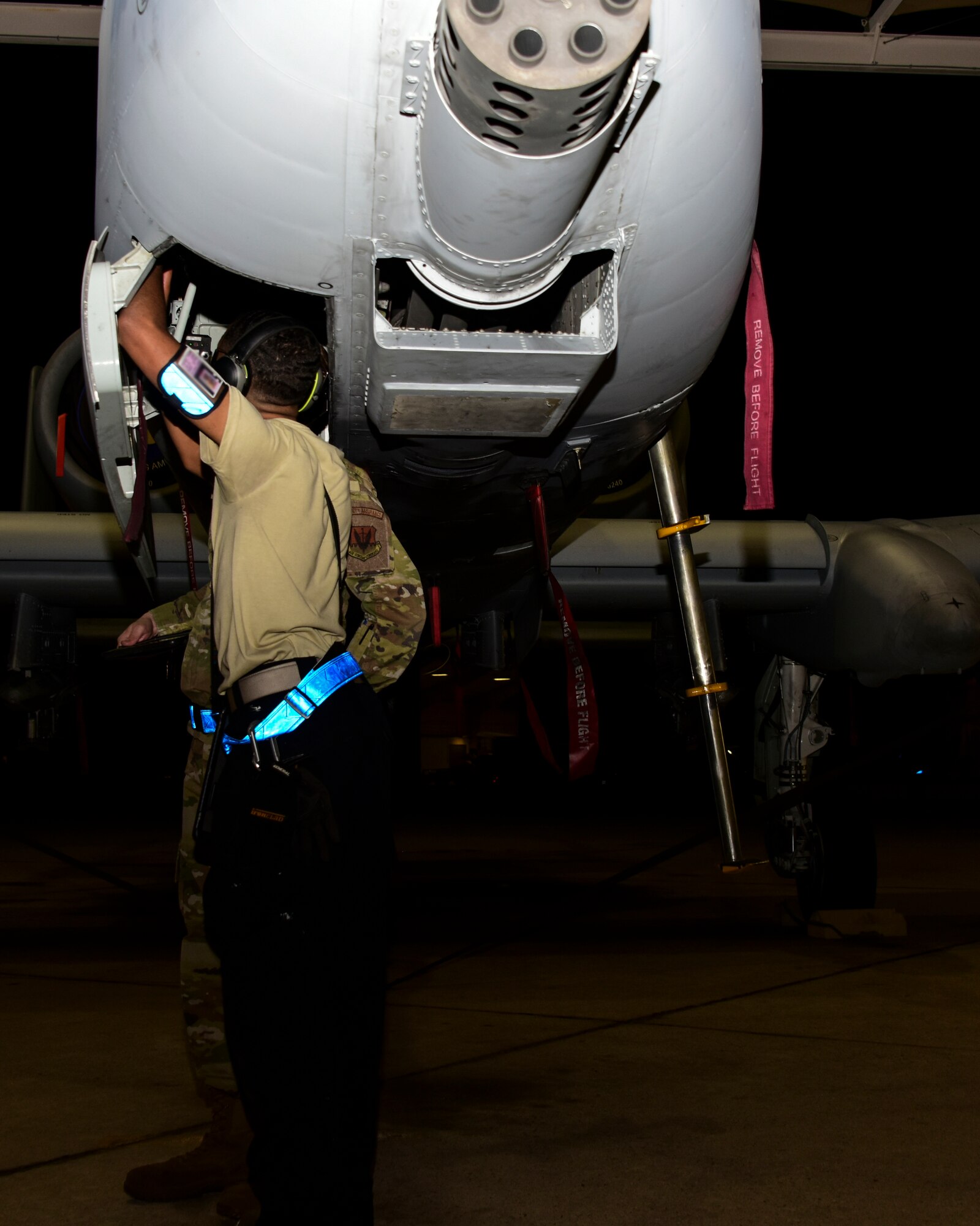 Airman inspects an A-10