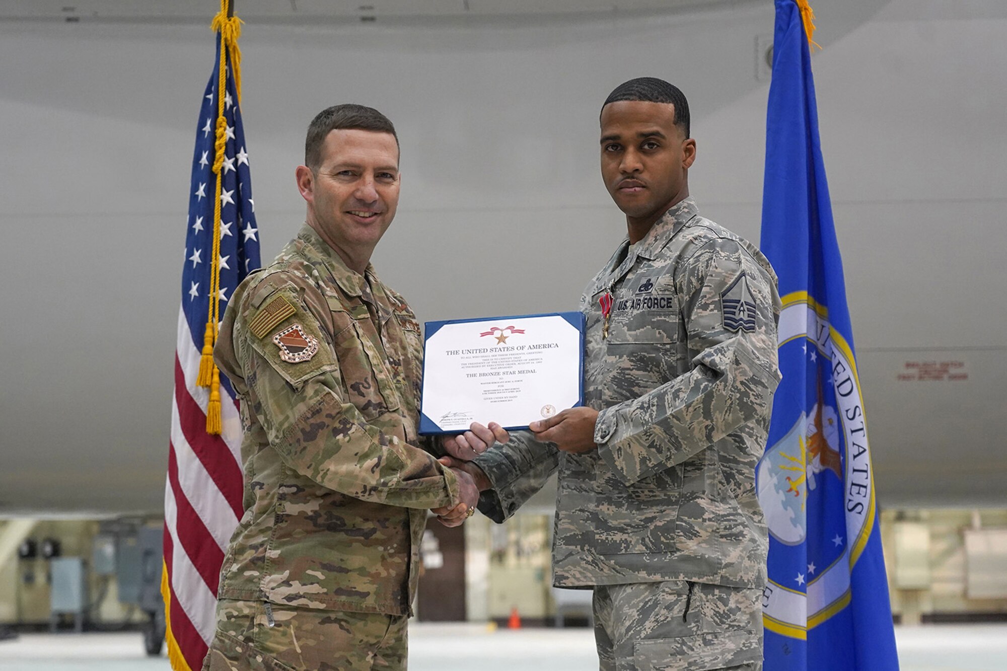 Air Force Master Sgt. Jehu Forte, assigned to the 703rd Aircraft Maintenance Squadron, is awarded the Bronze Star Medal for meritorious service.