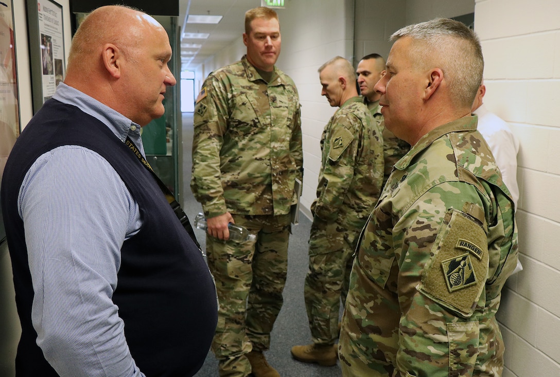 Lt. Gen. Todd T. Semonite, the 54th Chief of Engineers and Commanding General of the U.S. Army Corps of Engineers (right) discusses workforce transformation issues with a member of the Transatlantic Division Team.