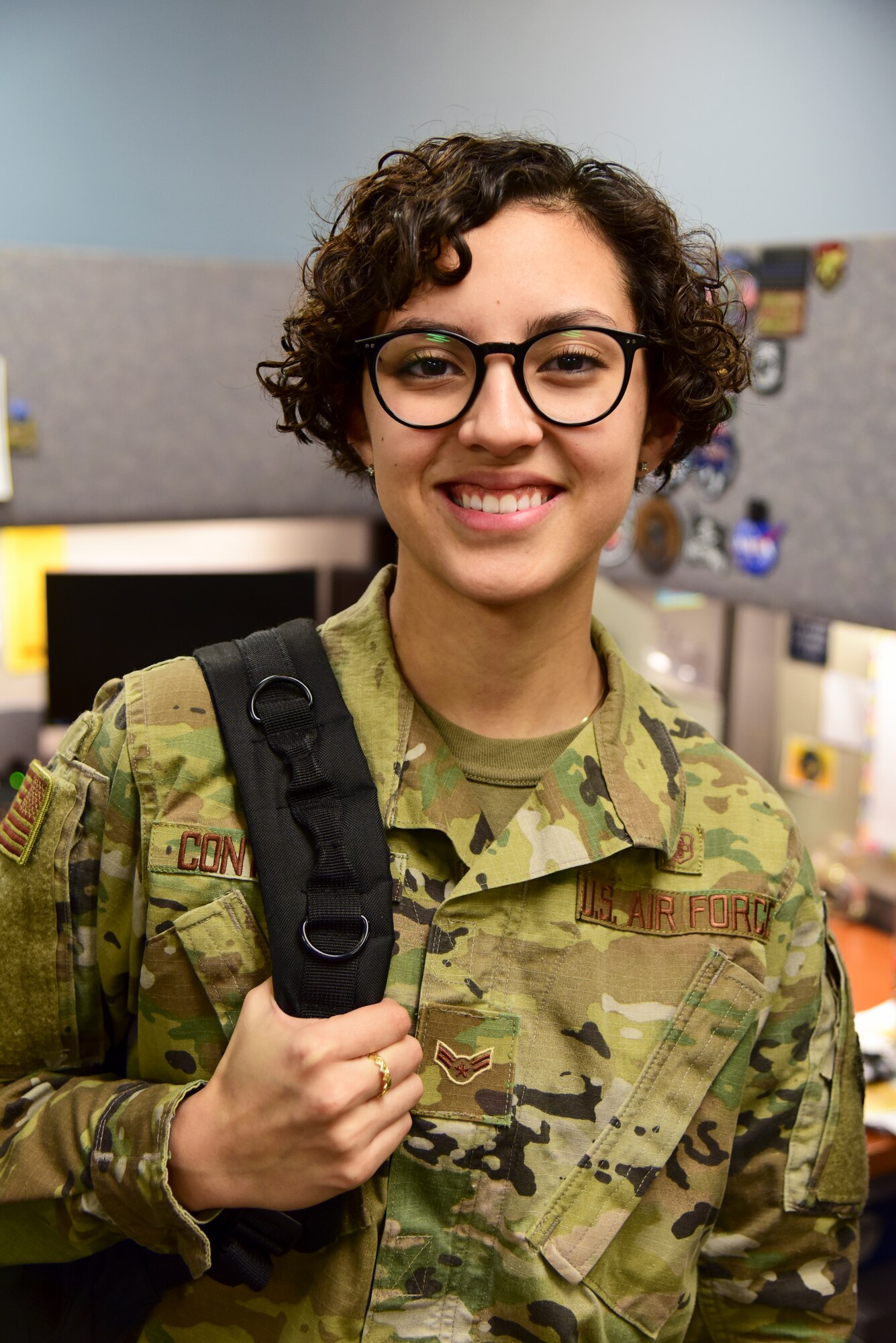 Airman 1st class Sahira Contreras, 47th Healthcare Operations Squadron referral management technician, stands in her office where she helps patients at the Laughlin Air Force Base, Texas, medical center, Jan. 9, 2020. She was awarded Senior Airman Below the Zone on December 2019, giving her privilege of donning her next stripe and the next level of responsibility six months earlier than normal. (U.S. Air Force photo by Senior Airman Anne McCready)