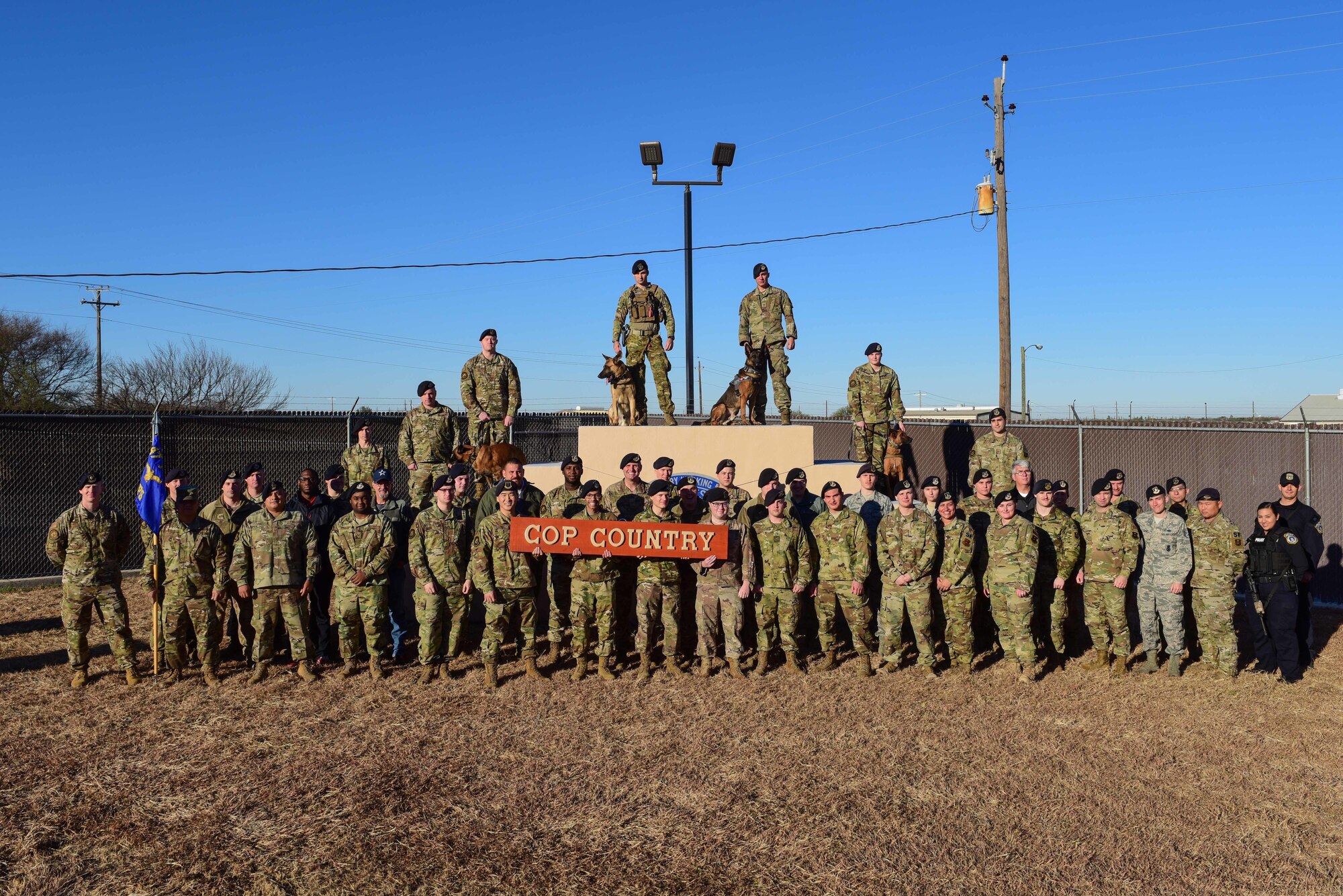 Members of the 47th Security Forces Squadron pose for a group photo at Laughlin Air Force Base, Texas, Jan. 7, 2020. Every year on Jan. 9, the nation takes a day to celebrate and honor the service of all law enforcement agencies around the country and abroad as Law Enforcement Appreciation Day. This includes military law enforcement’s public service to ensure members of Laughlin work and live in a safe, threat-free environment. (U.S. Air Force photo by Staff Sgt. Benjamin N. Valmoja)