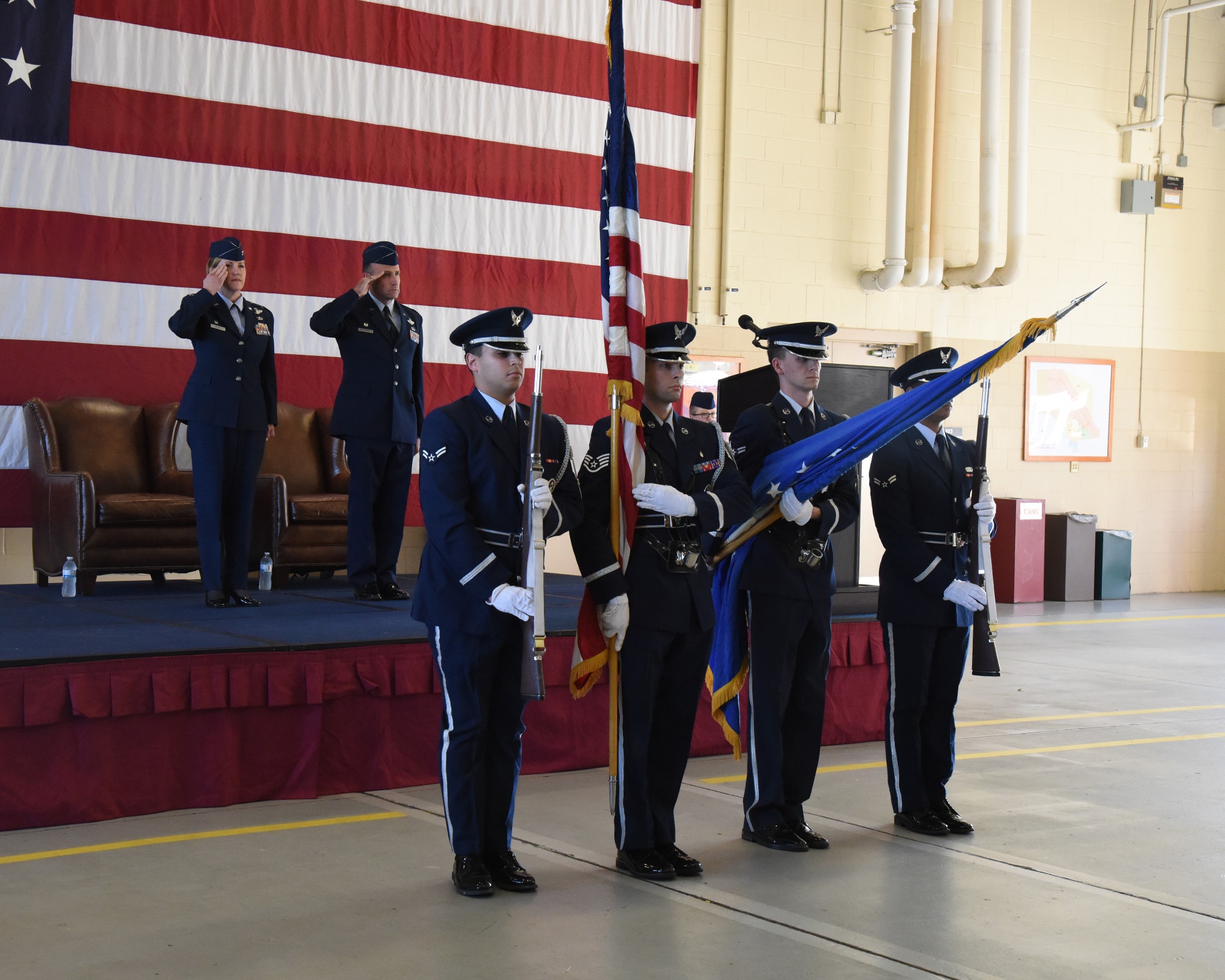 Col. Samantha Weeks, 14th Flying Training Wing commander and Lt. Col. William McElhinney salute as the Colors are being posted at the 14th Operations Group assumption of command Jan. 6, 2020, at Columbus Air Force Base, Miss. The group conducts pilot training and Introduction to Fighter Fundamentals for more than 400 U.S. Air Force and international officers each year. (U.S. Air Force photo by Elizabeth Owens)