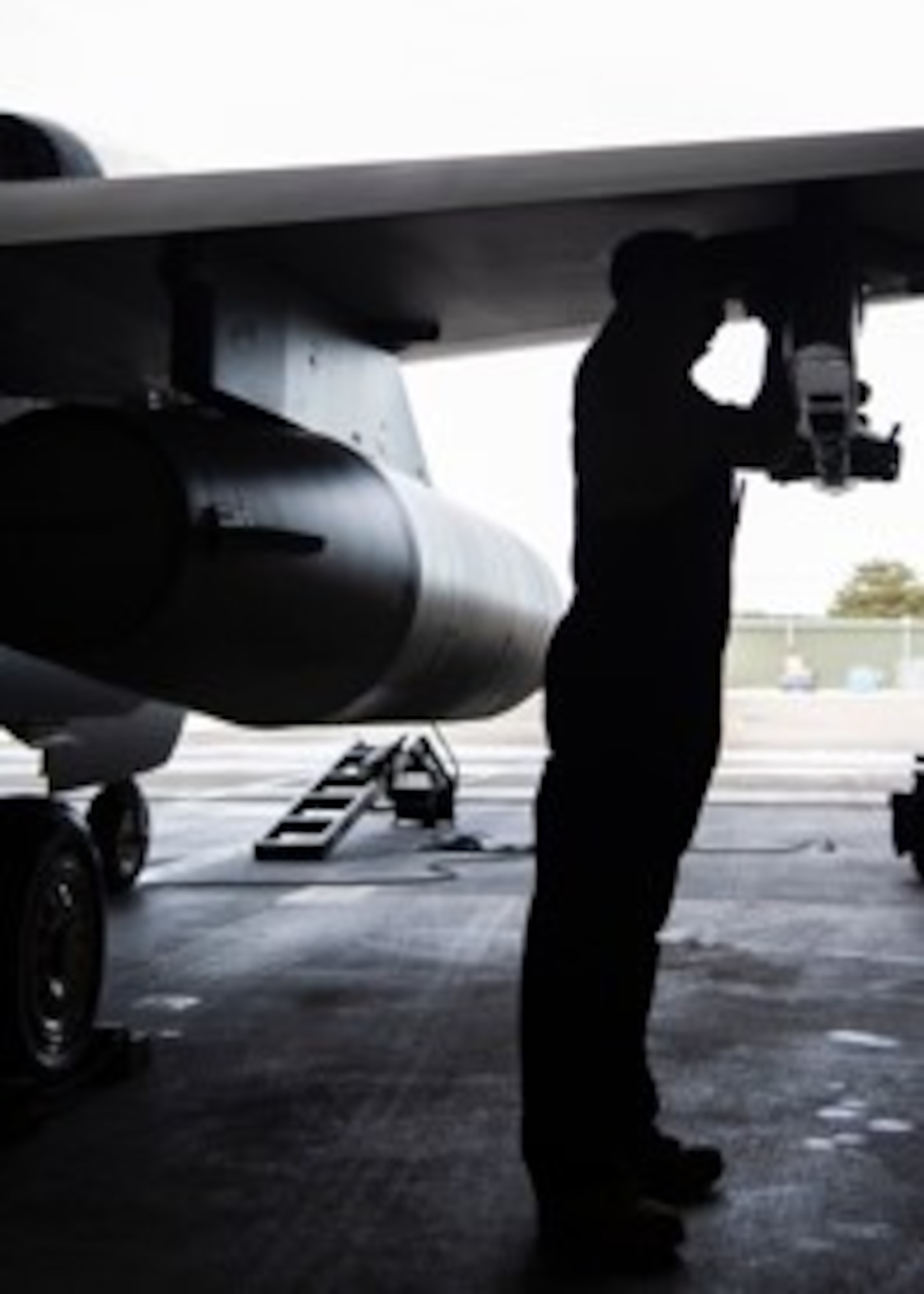 Airman 1st Class Andre Patterson, a 14th Aircraft Maintenance Unit weapons load crew member, safety wires an aft bolt at Misawa Air Base, Japan, Jan. 7, 2020. Weapons loaders perform three essential jobs: loading munitions, end-of-runway inspections and armament maintenance. The purpose of EOR is to arm the munitions on the jet and ensure it is safe to fly. (U.S. Air Force photo by Airman 1st Class China M. Shock)