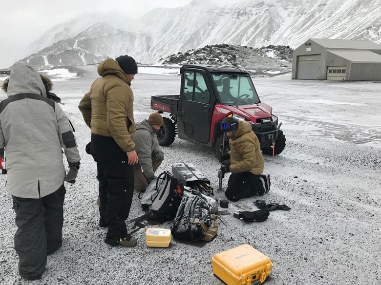 Members of the 435th Contingency Response Squadron conduct a landing zone survey at Jan Mayen Airfield, Norway, Nov. 19, 2019. While in Norway, the 435th CRS survey team assessed runway surfaces, obstructions and firing capes