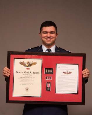 Civil Air Patrol Cadet Col. Zane Fockler poses for a photo with his Spaatz Award Jan. 8, 2020, at RAF Mildenhall, England. Fockler joins approximately 0.5 percent of cadets to have earned the Civil Air Patrol’s highest cadet honor. (U.S. Air Force photo by Airman 1st Class Joseph Barron)