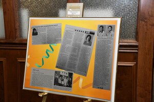 newspaper clippings on yellow poster