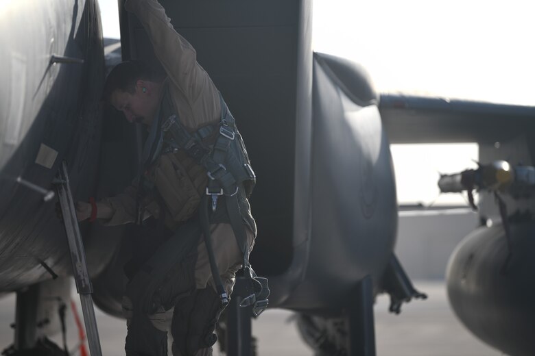 U.S. Air Force Staff Sgt. Zackary Suttles, a crew chief with the 378th Expeditionary Maintenance Squadron, conducts a post landing inspection on an F-15E Strike Eagle at Prince Sultan Air Base, Kingdom of Saudi Arabia, Jan. 4, 2020.
