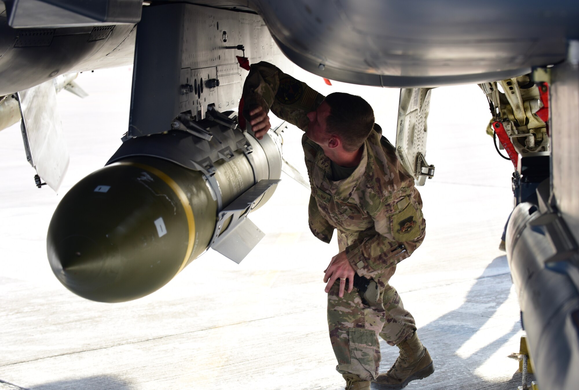 U.S. Air Force Master Sgt. Nathaniel Powers, munitions team lead with the 378th Expeditionary Maintenance Squadron, conducts an inspection of the armaments on an F-15E Strike Eagle at Prince Sultan Air Base, Kingdom of Saudi Arabia, Jan. 4, 2020.