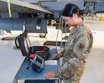 U.S. Air Force Staff Sgt. Rebecca Toland, a non-destructive inspection technician from the 140th Maintenance Squadron, Colorado Air National Guard, located at Buckley Air Force Base, Aurora, Colorado, performs an inspection of the 446 bulkhead on a block-30 F-16 Fighting Falcon aircraft Sept. 12, 2019. The 446 bulkhead is the aft fuselage structure of the F-16 that supports the tail structure and recent tests have indicated an increased amount of stress cracks in this area. (U.S. Air National Guard photo by Senior Master Sgt. John Rohrer)