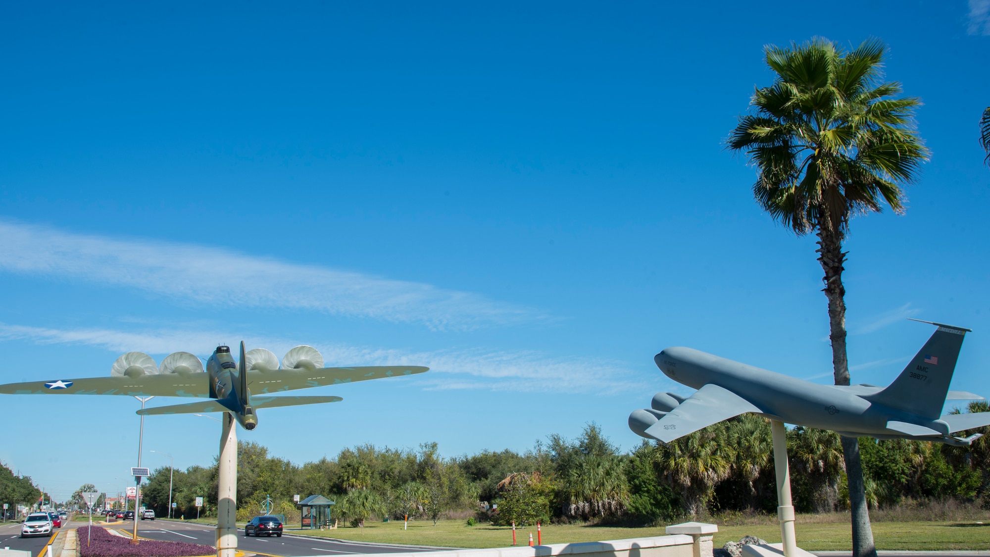 Scale models of the Memphis Belle, a B-17 Flying Fortress, and a KC-135 Stratotanker are displayed near the front gate of MacDill Air Force, Fla. (U.S. Air Force photo by Airman 1st Class Shannon Bowman)