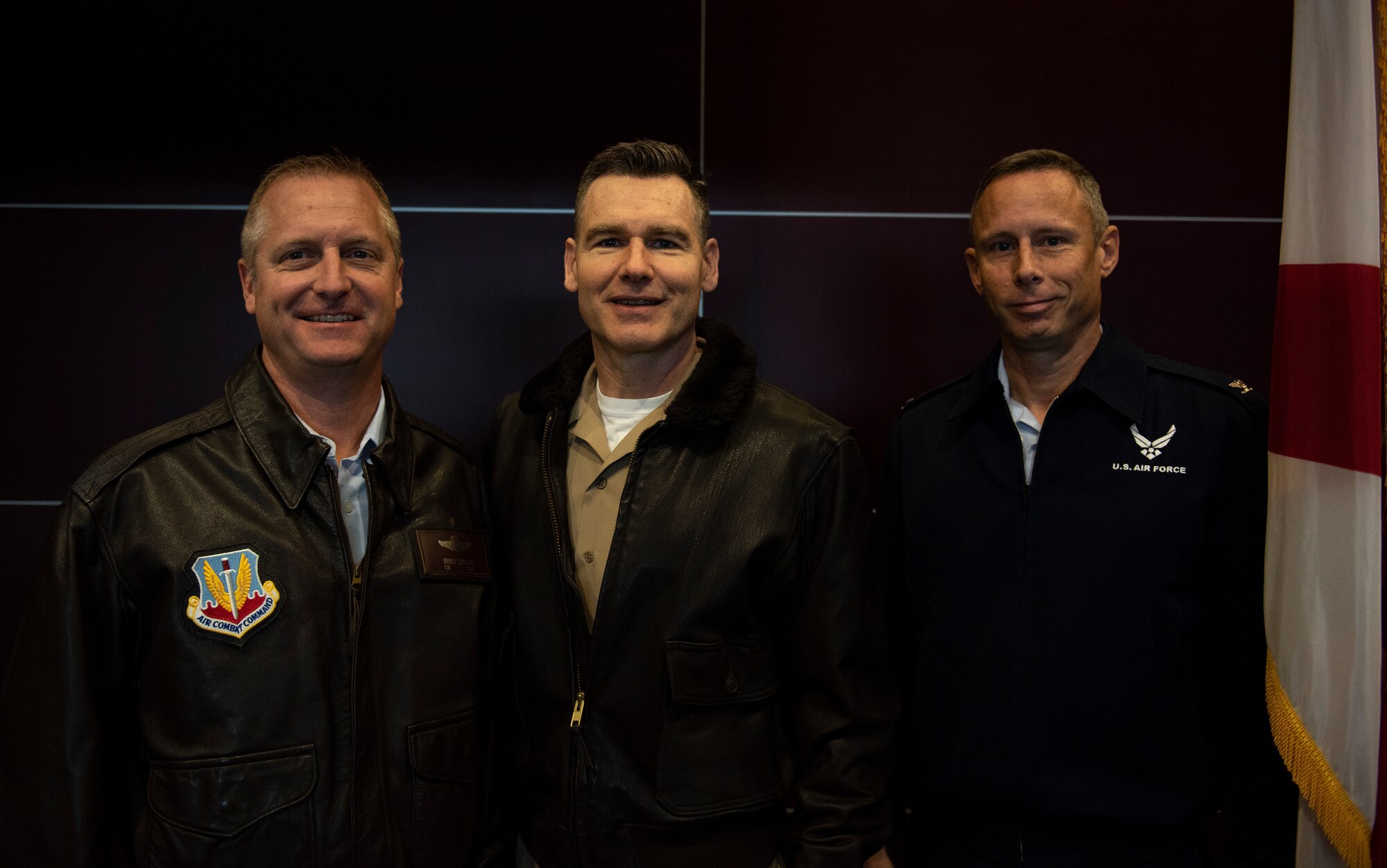 U.S. Air Force Col. Brian Laidlaw, 325th Fighter Wing commander, left, U.S. Navy Cmdr. Kevin Christenson, Naval Support Activity Panama City commanding officer, center, and U.S. Air Force Col. Travis Leighton, Tyndall Program Management Office director, pose for a photo at the Bay County Chamber of Commerce First Friday meeting at Panama City, Florida, Jan. 10, 2020. They attended the event as representatives of military communities in the local area. (U.S. Air Force photo by Staff Sgt. Magen M. Reeves)