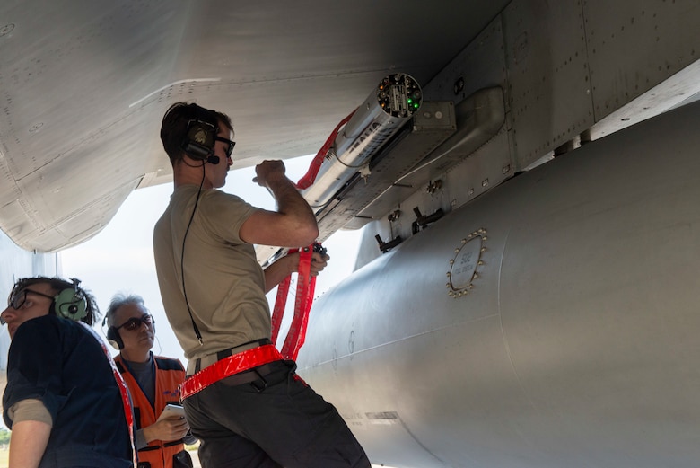 Airmen of the 18th Aircraft Maintenance Squadron arm a 44th Fighter Squadron F-15C Eagle during Exercise WestPac Rumrunner at Kadena Air Base, Japan, Jan. 10, 2020.  The 18th Wing-led exercise validated new ways to deploy and maneuver assets in order to operate in contested environments.  (U.S. Air Force photo by 2nd Lt. Ryan Simpson)