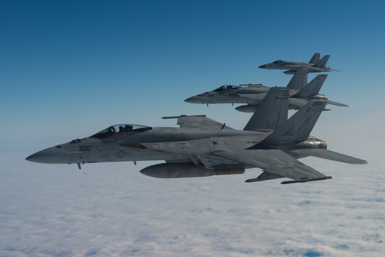 Three U.S. Navy F/A-18E Super Hornets from Marine Corps Air Station Iwakuni, Japan, fly in formation during Exercise WestPac Rumrunner Jan. 10, 2020. The WestPac Rumrunner exercise brought Airmen and joint partners together to train and execute innovative ways to deploy forces in a contested environment. (U.S. Air Force photo by Senior Airman Cynthia Belío)