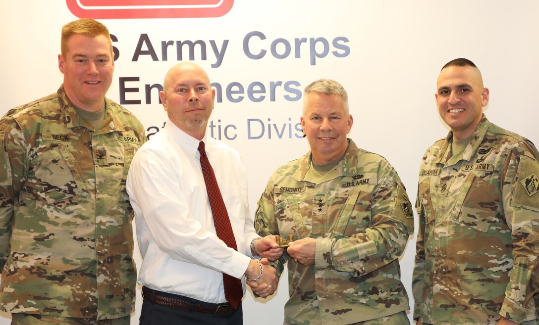 Lt. Gen. Todd T. Semonite, the 54th Chief of Engineers and Commanding General of the U.S. Army Corps of Engineer, “coined” TAD Logistics Specialist Tim O'Dell.