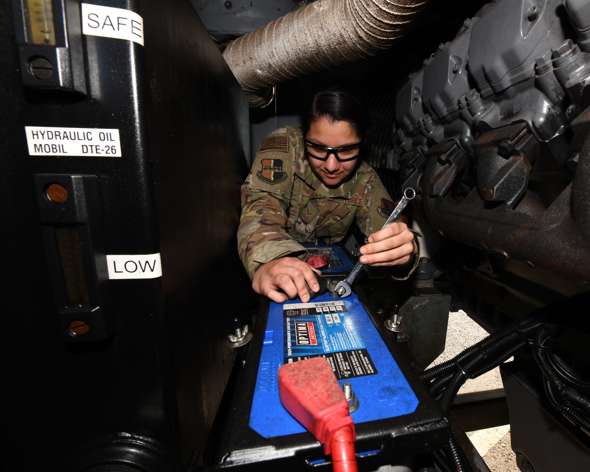 Senior Airman Sierra Garcia, 9th Maintenance Squadron aerospace ground equipment apprentice, tightens a nut on the battery of a TLD air conditioning unit, Jan. 7, 2020 at Beale Air Force Base, California. The 9th MXS AGE flight inspects, repairs, modifies, and delivers over 500 pieces of equipment worth around $23 million. (U.S. Air Force photo by Airman 1st Class Luis A. Ruiz-Vazquez)