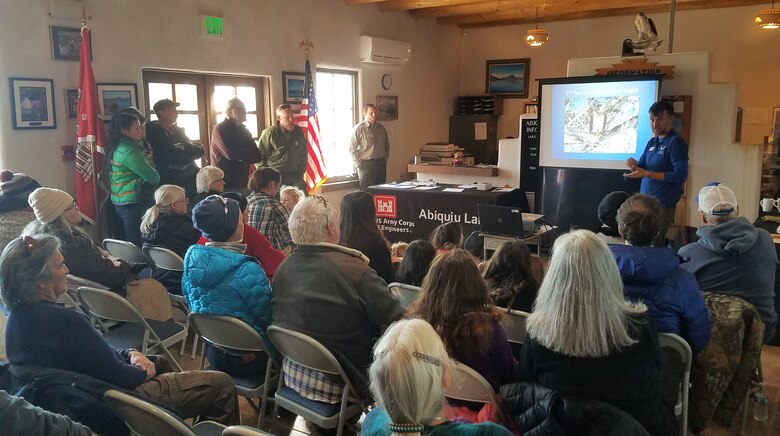 Alex Patia, with the New Mexico Wildlife Center, gives a short presentation to volunteers during the annual eagle watch at Abiquiu Lake, Jan. 4, 2020. Patia discussed the history of the survey, how to identify immature and mature eagles, and what other birds may be out on the lake at this time of year.