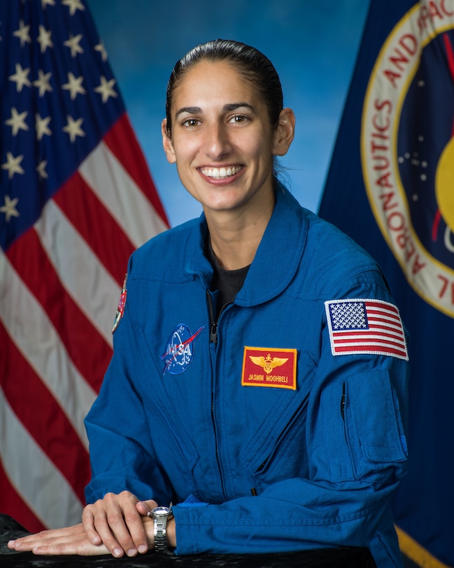 asmin Moghbeli was selected by NASA to join the 2017 Astronaut Candidate Class. She reported for duty in August 2017 and having completed the initial astronaut candidate training is now eligible for a mission assignment.. The New York native earned a Bachelor of Science degree in Aerospace Engineering with Information Technology at the Massachusetts Institute of Technology and a Master of Science in Engineering Science degree in Aerospace Engineering from the Naval Postgraduate School. Moghbeli, an AH-1W Super Cobra pilot and Marine Corps test pilot, has over 150 combat missions and 2,000 hours of flight time in over 25 different aircraft. She is also a distinguished graduate of the U.S. Naval Test Pilot School in Patuxent River, MD
