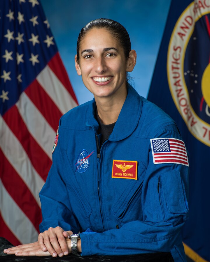 asmin Moghbeli was selected by NASA to join the 2017 Astronaut Candidate Class. She reported for duty in August 2017 and having completed the initial astronaut candidate training is now eligible for a mission assignment.. The New York native earned a Bachelor of Science degree in Aerospace Engineering with Information Technology at the Massachusetts Institute of Technology and a Master of Science in Engineering Science degree in Aerospace Engineering from the Naval Postgraduate School. Moghbeli, an AH-1W Super Cobra pilot and Marine Corps test pilot, has over 150 combat missions and 2,000 hours of flight time in over 25 different aircraft. She is also a distinguished graduate of the U.S. Naval Test Pilot School in Patuxent River, MD