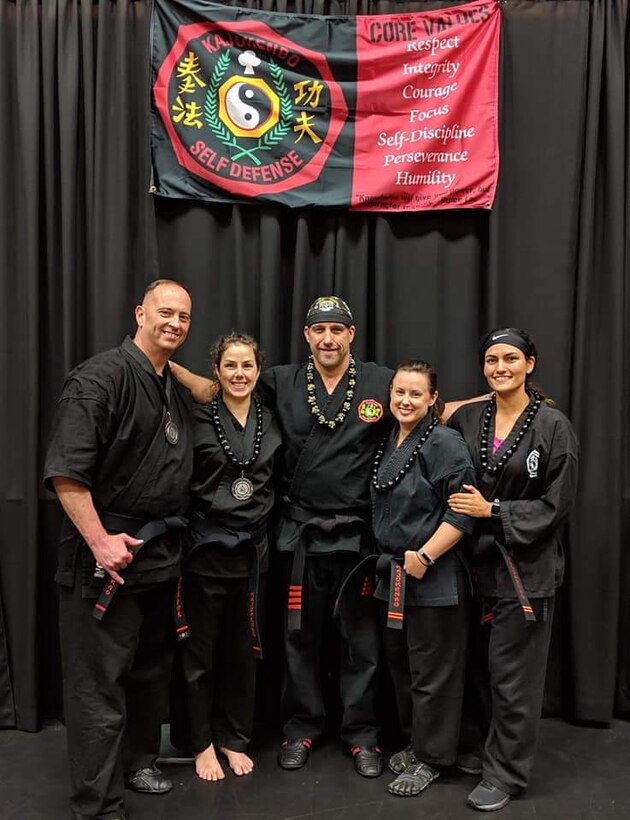 Senior Master Sgt. Scott Newberger, assigned to the 161st Air Refueling Wing, poses with fellow back belt Dojo martial artists, Phoenix, Ariz., December 17, 2019. Newberger is passionate about his experience in martial arts and how it propels him in his military career. (Courtesy photo, SMSgt Scott Newberger)