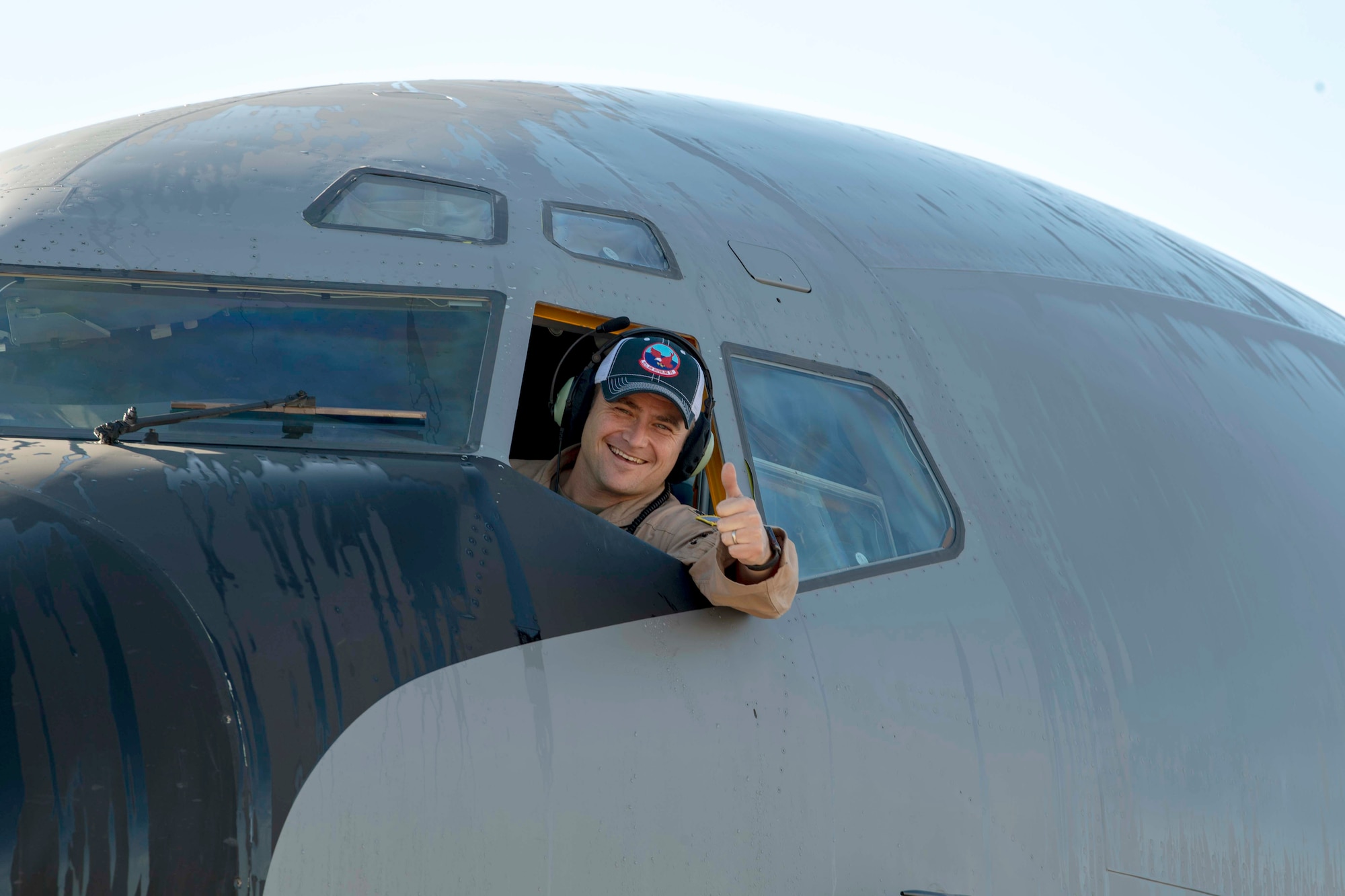 U.S. Air Force Lt. Col. Adam C. Dalson, the 911th Air Refueling Squadron (ARS) commander, gives a thumbs up after parking a KC-135 Stratotanker on the flightline on Seymour Johnson Air Force Base, North Carolina, Dec. 16, 2019. The 911 ARS completed their final mission on a KC-135. (U.S. Air Force photo by Staff Sgt. Mary McKnight)