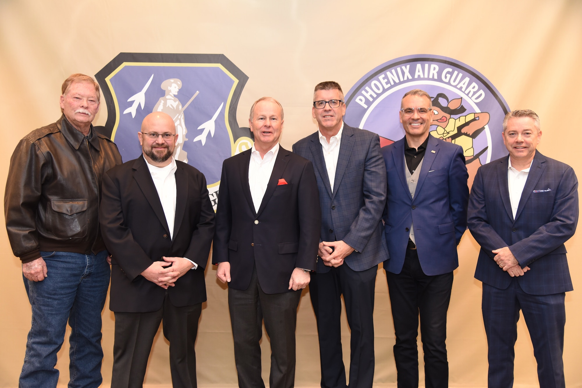 161st Air Refueling Wing Honorary Commander inductees pose for a group photo during the induction ceremony, Jan. 11. (U.S. Air National Guard photo by Tech. Sgt. Anthony Reynolds)