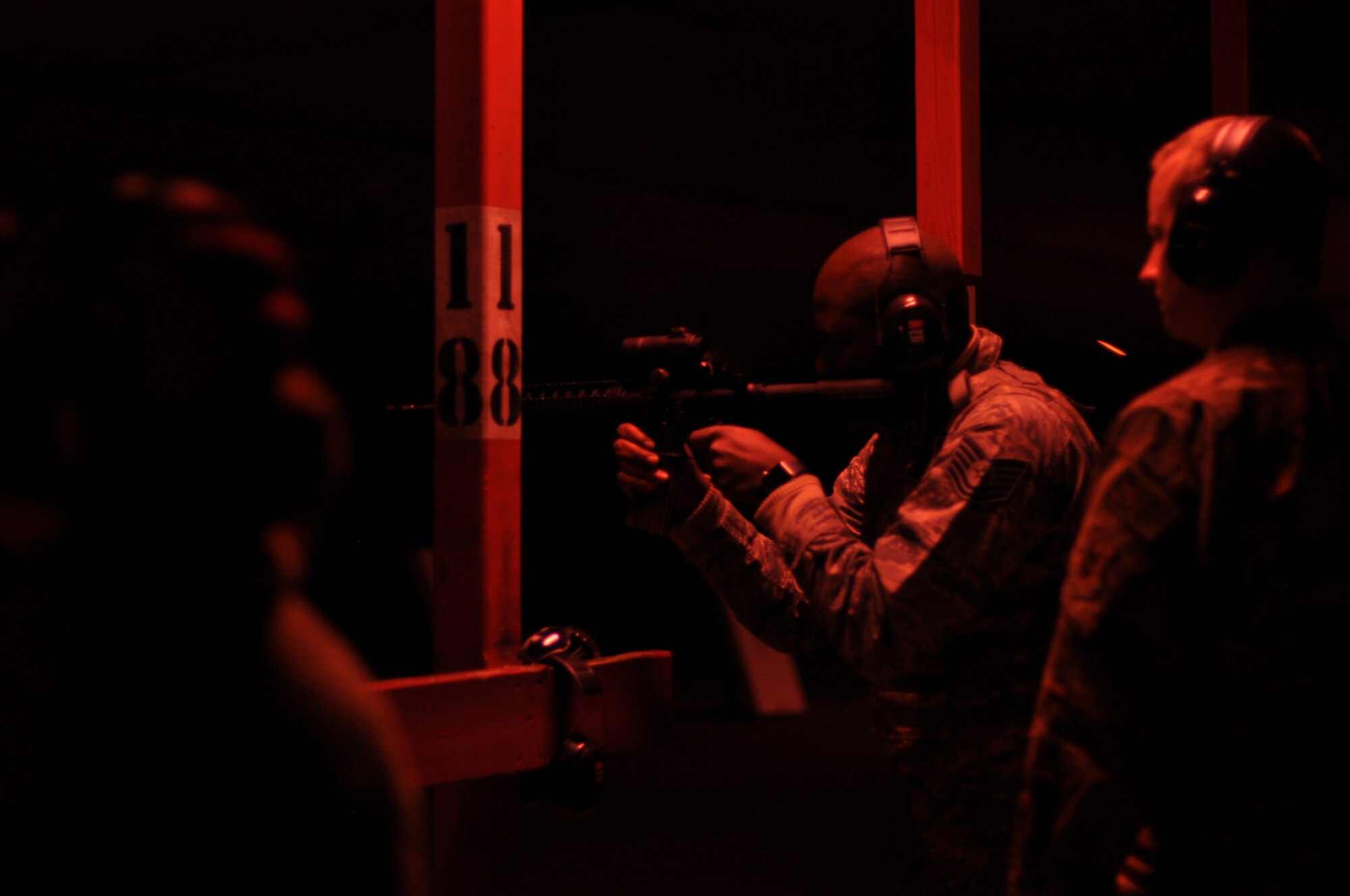 Technical Sgt. Marcus Johnson, 908th Security Forces Squadron defender, shoots his M4 carbine with night vision optics Nov. 2, 2019, in the firing bay at Maxwell AFB, Alabama. The SFS defenders train for multiple types of scenarios so that they are prepared to fight in any type of situation and anywhere at a moment’s notice. (U.S. Air Force photo by Airman 1st Class Shelby S. Thurman)