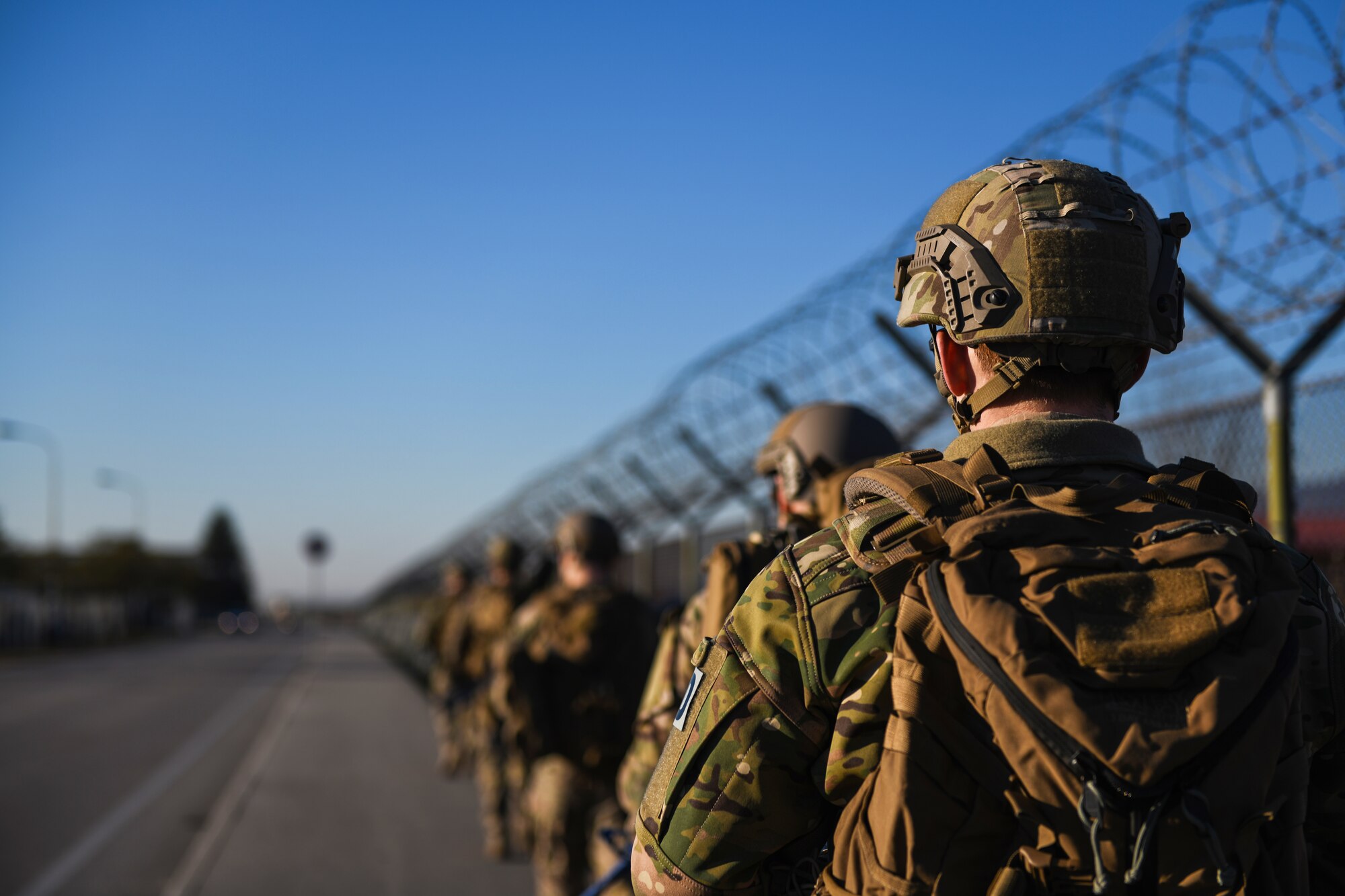 U.S. Airmen from the 31 Civil Engineer Squadron dismount to a training site at Aviano Air Base, Italy, Jan. 8, 2020. Explosive ordnance team members are trained to detect, disarm, detonate and dispose of explosive threats all over the world. (U.S. Air Force photo by Airman 1st Class Ericka A. Woolever).