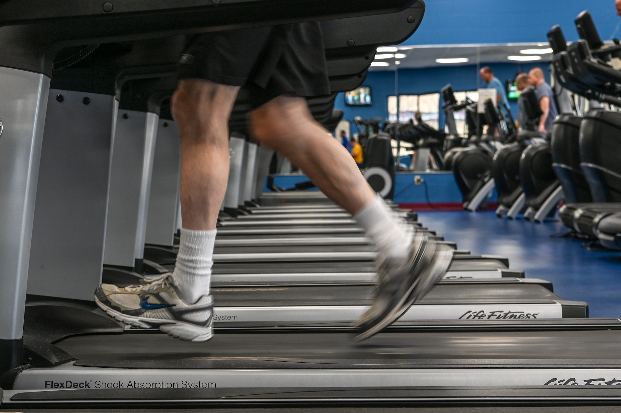 Peter Connelly runs on a treadmill in the cardio room at the Hanscom Fitness and Sports Center Jan. 10. The facility is open Monday through Friday from 5 a.m. to 9 p.m. and weekends and holidays from 8 a.m. to 3 p.m. 24/7 access is available and requires registration. More information is available at www.hanscomfss.com/fitness-sports-center or at 781-225-6630.  (U.S. Air Force Photo by Mark Herlihy)