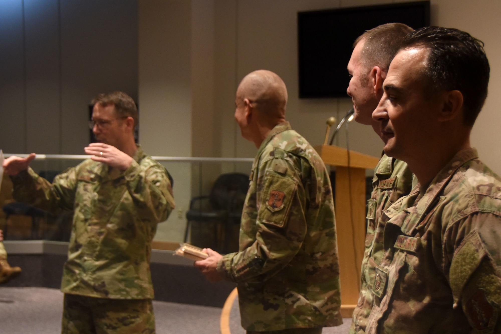 U.S. Air Force North Carolina Assistant Adjutant General for Air, Brig. Gen. Stephen Mallette (far left), and State Command Chief Master Sgt. David Rodriguez (left), commend Master Sgt. Daniel Judd (right) and Master Sgt. Kernice Locklear (far right), 263rd Combat Communications Squadron with awards during an all-call held at the New London, N.C. Air National Guard Base (NCANG) headquarters, Jan. 12, 2020. Members of the NCANG celebrated the accomplishments of Master Sgts. Judd and Locklear who attended the United States Marine Corps Staff Non-Commissioned Officer Academy last year in an effort to better understand the traditions and customs of a sister service. Since attending the academies, Judd and Locklear have implemented U.S. Marine Corps. practices such as sharing unit history and helping newer Airmen feel more involved with more responsibilities.