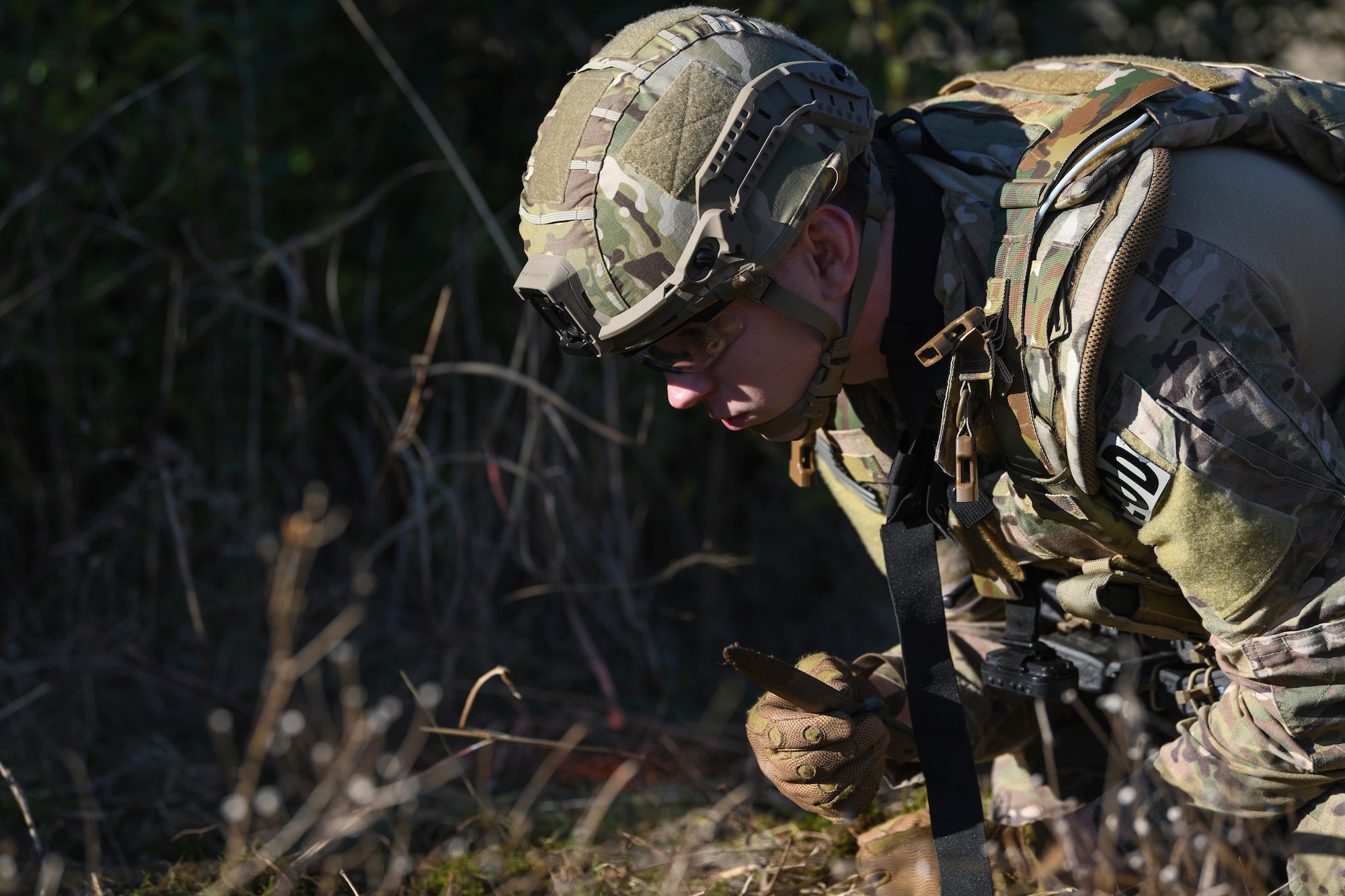 U.S. Air Force Staff Sgt. Jackson Judge, explosive ordnance team member from the 31 Civil Engineer Squadron, searches for hazards during a training exercise at Aviano Air Base, Italy, Jan. 8, 2020. EOD Airmen are trained to detect, disarm, detonate and dispose of explosive threats all over the world, EODs are the specialists who bravely serve as the Air Force’s bomb squad. (U.S. Air Force photo by Airman 1st Class Ericka A. Woolever).