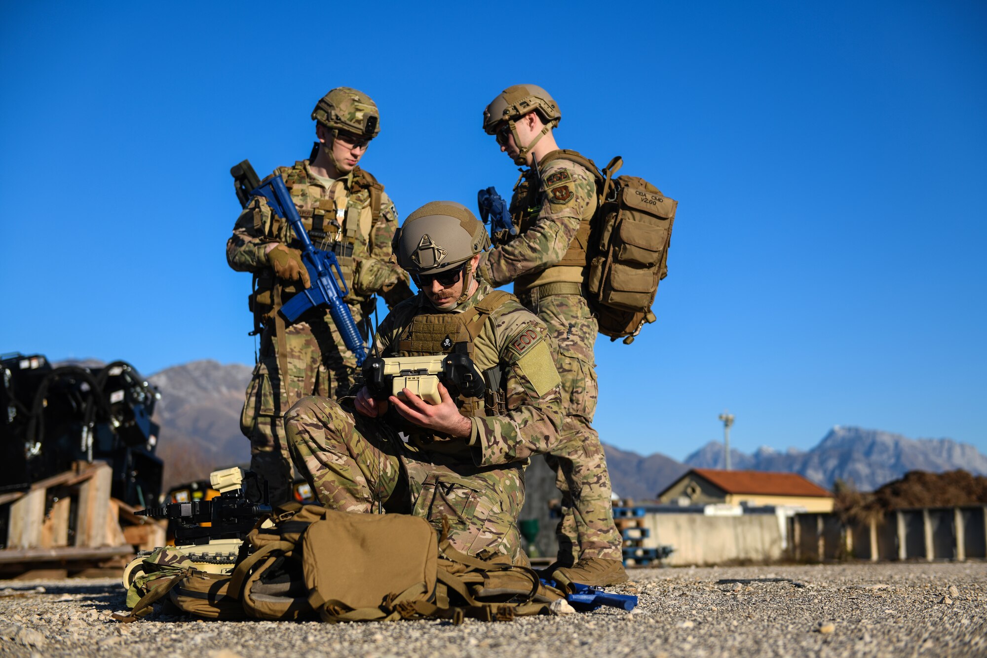 U.S. Air Force Staff Sgt. Jackson Judge, left, Airman 1st Class Tyler McConnell, and Senior Airman Colby Forsythe, explosive ordnance team members from the 31 Civil Engineer Squadron, prepare equipment during a training exercise at Aviano Air Base, Italy, Jan. 8, 2020. EOD Airmen are often assigned to some of the most dangerous missions and  perform tactically harrowing and technically demanding tasks in diverse environments worldwide. (U.S. Air Force photo by Airman 1st Class Ericka A. Woolever).
