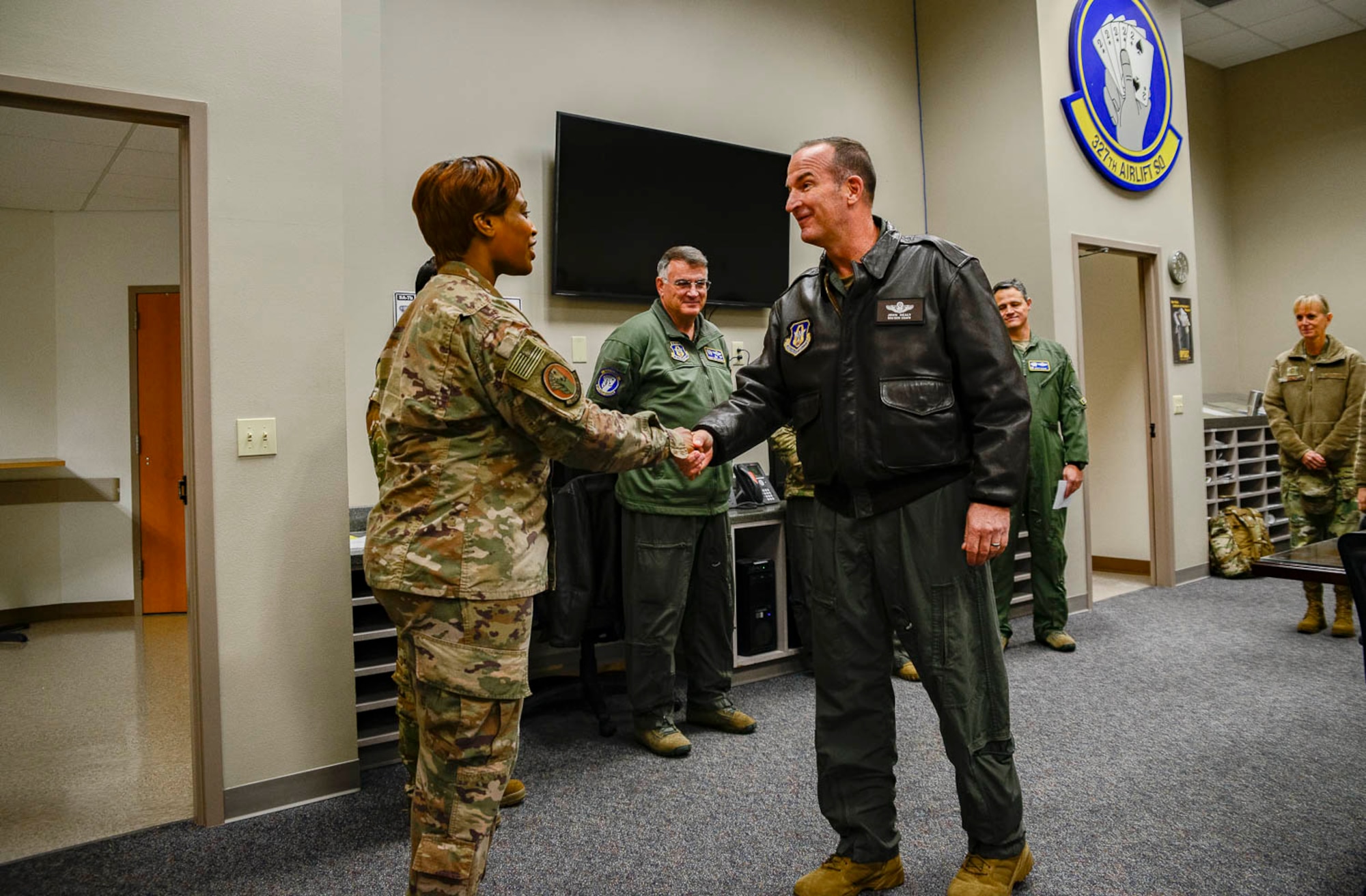 Healy spoke to several groups of Airmen throughout the visit, gaining insight into how the unit provides combat-ready Airmen, tactical airlift and agile combat support. (U.S. Air Force Reserve photo by Senior Airman Nathan Byrnes)