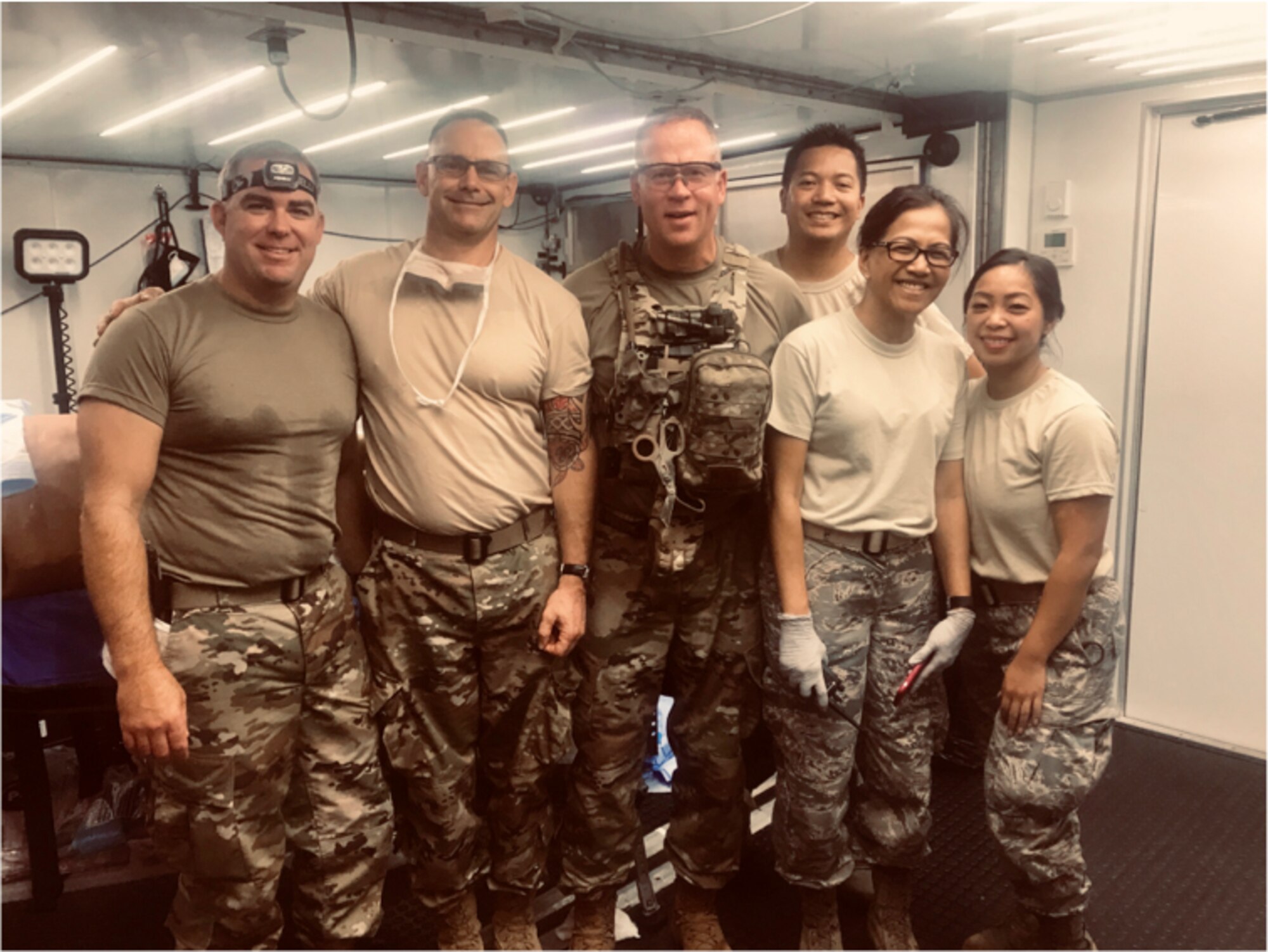 Left to Right, Lt. Col. (Dr.) Sean Martin, Maj. Jason Vallot, Lt. Col. (Dr.) Jesse Wells, Capt. Llewy Rimular, Lt. Col. Jessica Arcilla and Tech Sgt. MaryLou Ancheta of the 349th Medical Squadron, Travis Air Force Base, California, comprise the first team of Air Force Reservists to complete the Air Force's new Ground Surgical Team training course. (Courtesy photos)