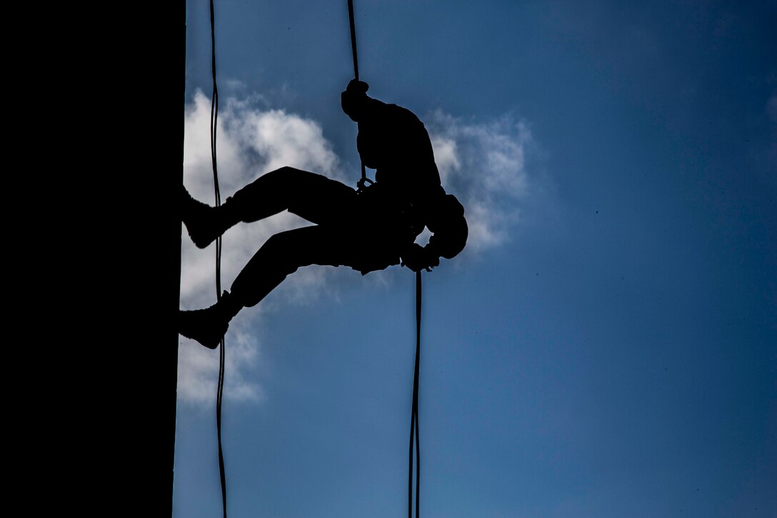 A U.S. Marine conducts rappelling during a Helicopter Rope Suspension Technique course on Camp Hansen, Okinawa, Japan, Jan. 8.