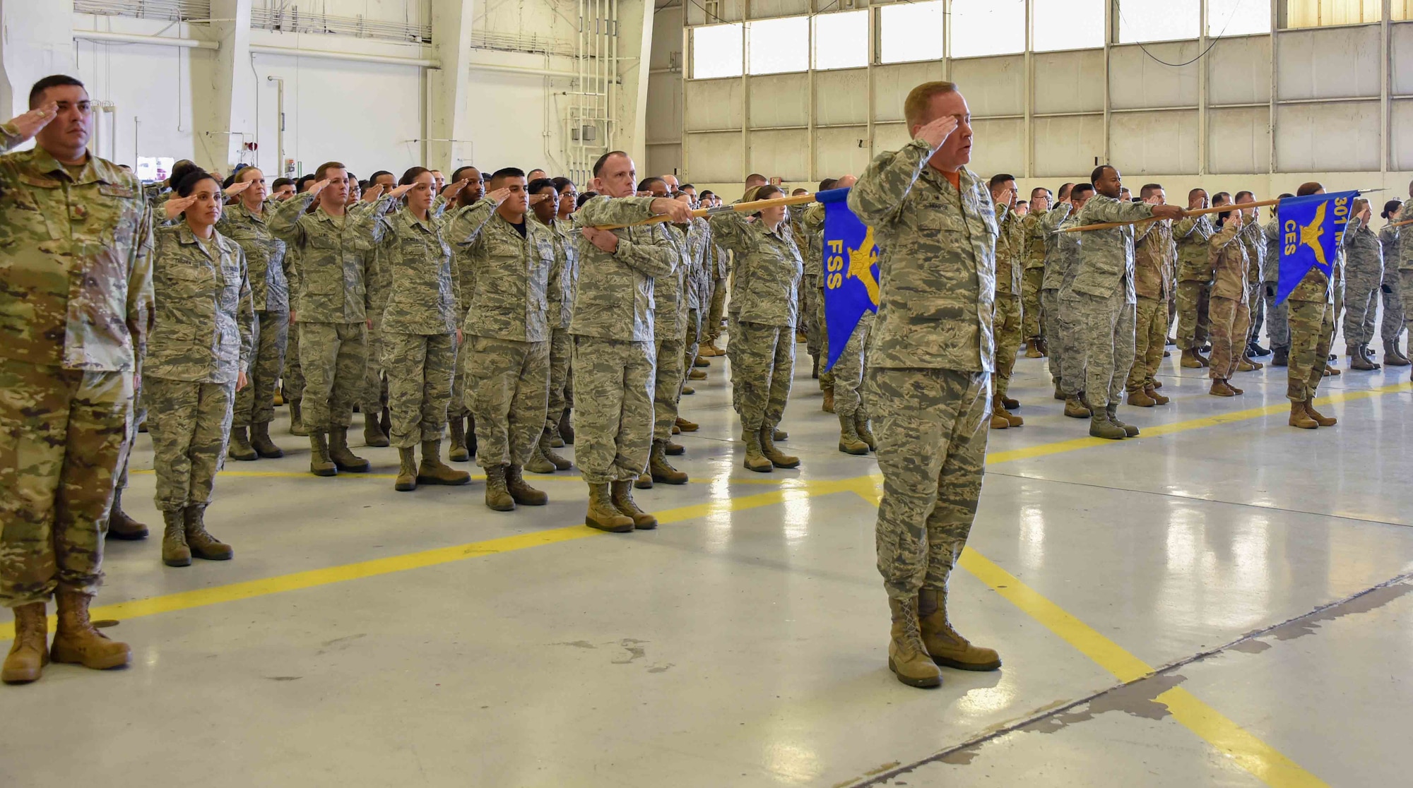 Airmen from the 301st Mission Support Group render Col. L. Gregg Russell, 301 MSG commander, his first salute, Jan. 12, 2020, at U.S. Naval Air Station Joint Reserve Base Fort Worth, Texas. The 301 MSG is comprised of six squadrons and five civilian departments. (U.S. Air Force photo by Senior Airman Brittany Landy)
