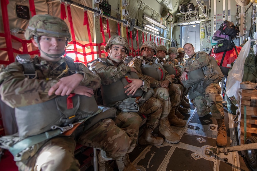 A U.S. soldier jumps in the air during the seventh annual Pat